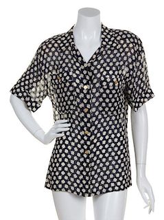 A Pair of Chanel Print Blouses,