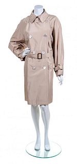 * An Hermes Khaki Double Breasted Trench Coat, Size 40.