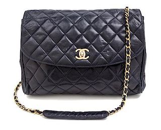 A Chanel Navy Quilted Leather Flap Handbag, 11" x 10" x 3".