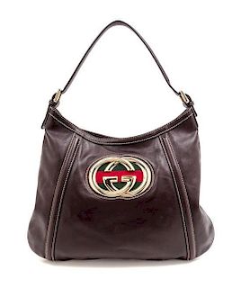 A Gucci Brown Leather Shoulder Bag, 16" x 11.5" x .5".
