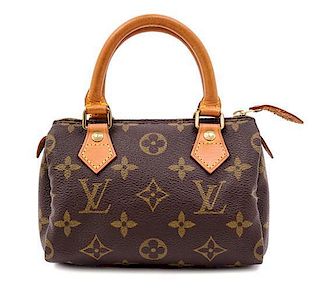 A Louis Vuitton Monogram Canvas Mini Handbag, 6.5" x 4.5" x 3".