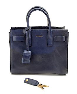 A Saint Laurent Blue Leather Mini Sac du Jour Handbag, 8.5" x 7" x 4".