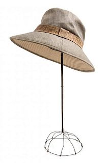 An Hermes Tan Hat, Size 55.