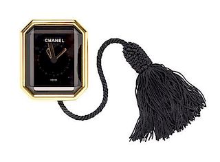 A Chanel Crystal and Goldtone Desk Clock, 2.5" x 2.5".