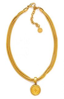 A Givenchy Triple Strand Pendant Necklace, 19".