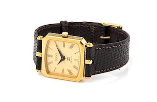 A Gucci Goldtone Watch, 8" x 1".