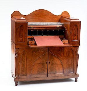 CLASSICAL CARVED MAHOGANY AND FIGURED MAHOGANY CYLINDER-FRONT DESK, PHILADELPHIA OR BALTIMORE, C. 1815