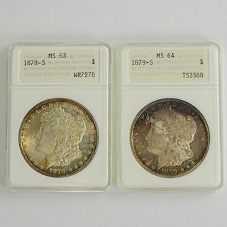 Two (2) Morgan Silver Dollars.