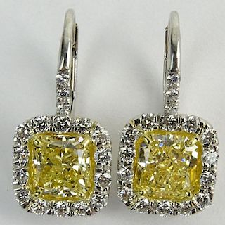 3.01 Carat Radiant Cut Fancy Intense Yellow Diamond, Platinum and 18 Karat Yellow Gold Dangle Earrings