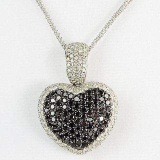 4.75 Carat Round Cut Black & White Diamond and 18 Karat White Gold Heart Pendant Necklace.