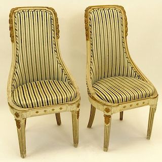 Pair of Mid 20th Century Italian Neoclassical style Carved Painted and Parcel Gilt Side Chairs.