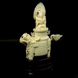 Vintage Chinese Carved Ivory on Hardwood Stand "Deity On Foo Lion" Inset with turquoise and coral beads.