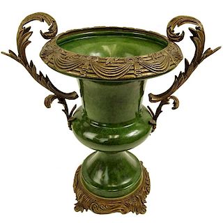 Modern Bronze Mounted Pottery Urn.