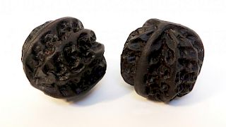 Two Carved Walnuts