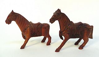 Two Carved Horn Horses