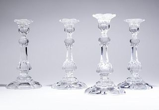 A set of 4 clear crystal Baccarat candlesticks