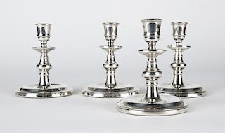 4 English silver candlesticks for Asprey London