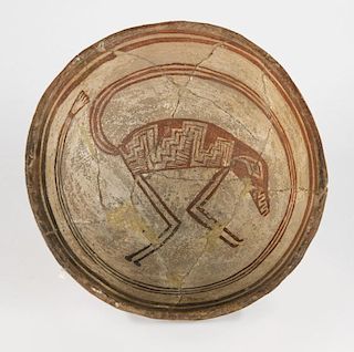 A Mimbres coatimundi-motif pottery bowl