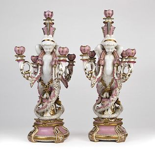 A pair of Sevres-style porcelain candelabra