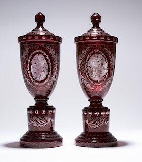 A pair of Bohemian cut-glass covered compotes