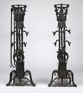 A pair of Gothic-style wrought iron fire dogs