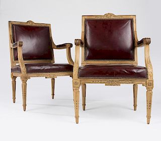A pair of Louis XVI-style beechwood armchairs