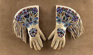 A Pair of Woodland Indian beaded gauntlets