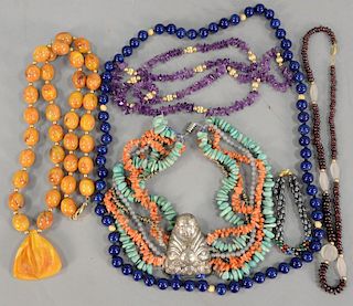 Lot of necklaces, one with coral and one with lapis.