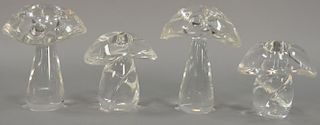 Four large Steuben colorless art glass mushrooms with stylish crystal tops all signed Steuben. ht. 5" to 7"