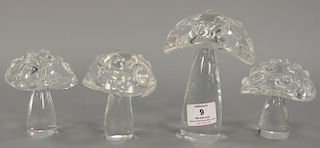 Four Steuben colorless art glass mushrooms with molted crystal mushroom tops, all four signed Steuben. ht. 4 in. to 6 in.