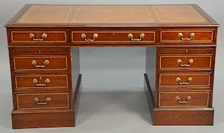 English style mahogany desk with tooled leather top in three parts. ht. 32 in.; top: 31" x 61"