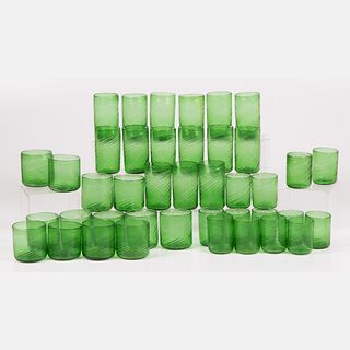 A Set Of Forty One Green Rib Twist Glassware 