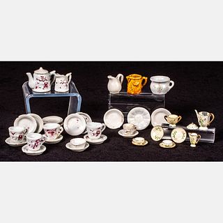 A Group of Dollhouse Tea Sets