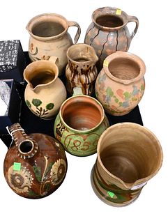 Eight Pottery and Stoneware Pitchers