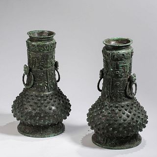 A Pair of Bronze Vases