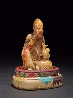 A Carved Shousan Deity Figurine