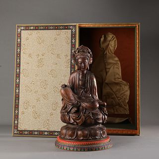 A Carved Agarwood Seated Guanyin Statue