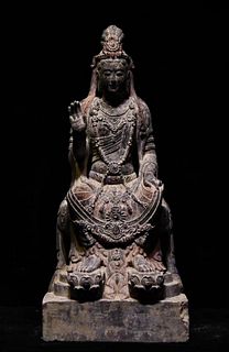 A Carved Stone Seated Guanyin Statue
