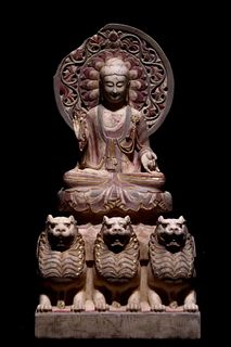 A Carved HanBaiYu Seated Buddha Statue