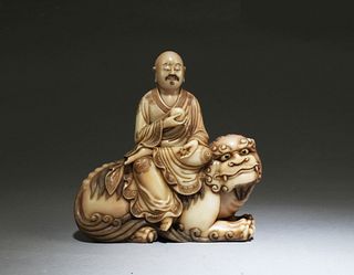 A Carved Soapstone Statue