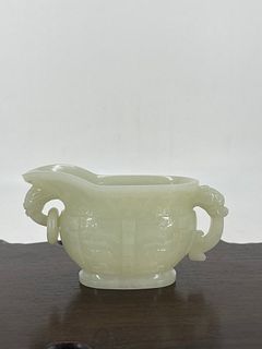 Carved white jade taotie ritual cup