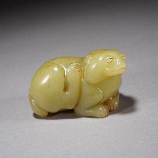 Carved yellow jade 'BEAST' paper weight