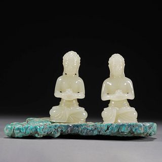 A set of carved white jade worship Shakyamuni sculptures