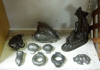 Collection of (9) Pewter Molds. 