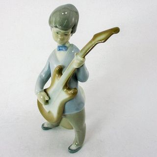 Boy w/Guitar 1004614 - Lladro Porcelain Figurine