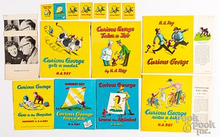 Group of Curious George promotional items