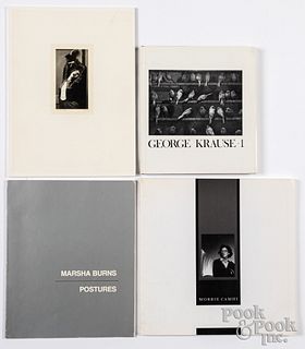 Four signed photo books