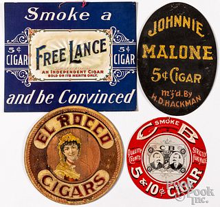 Four hanging paper cigar signs