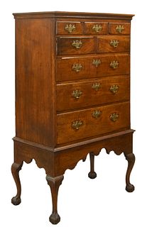 CHIPPENDALE FIGURED WALNUT CHEST ON FRAME