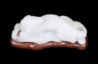 CHINESE CARVED JADE LIONESS OR LEOPARD ON STAND